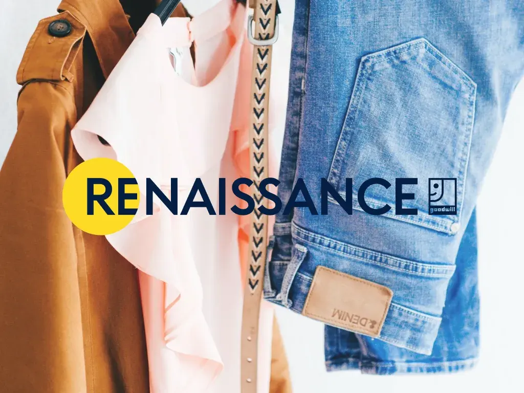 Renaissance logo on an image of hanging clothes